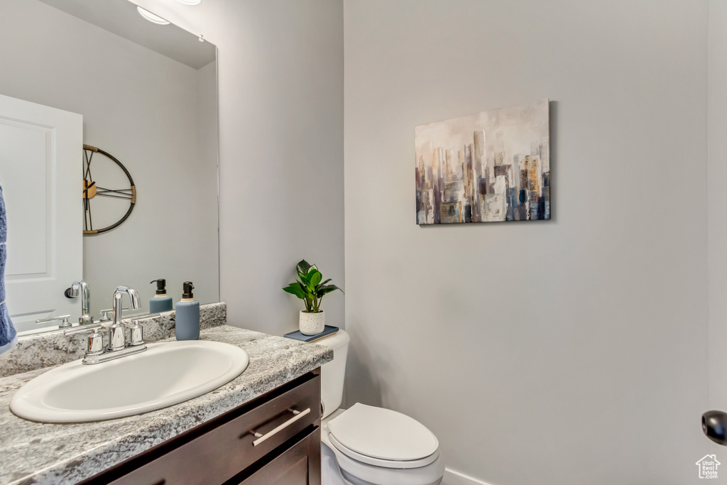 Bathroom with toilet and vanity