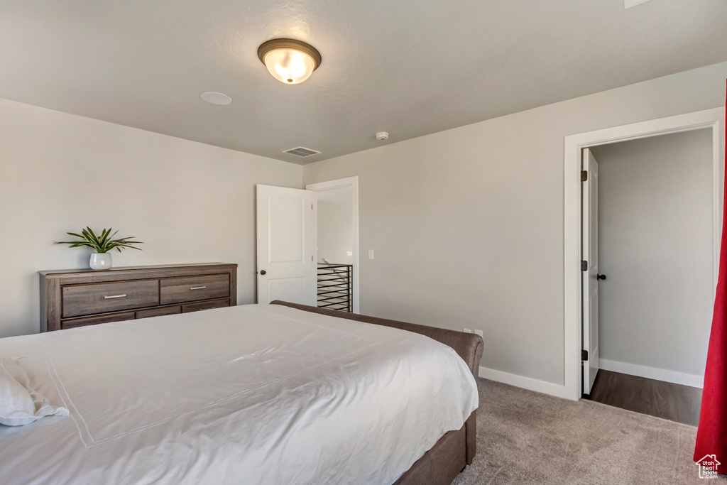 Bedroom with carpet