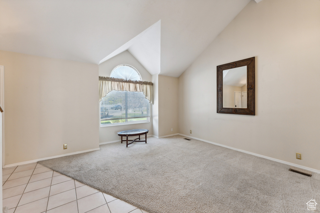 Interior space with vaulted ceiling