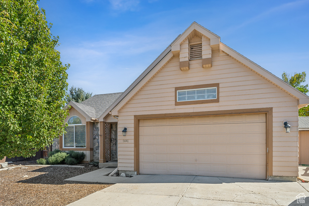 View of front facade with a garage