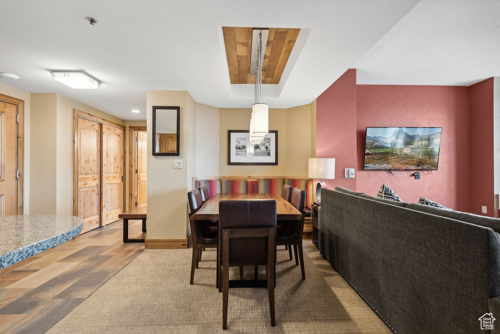 Dining room with wood-type flooring