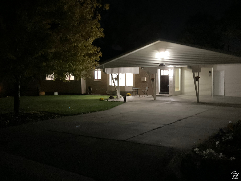 View of front of home with a yard