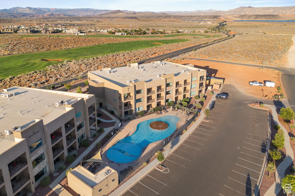 Birds eye view of property featuring a mountain view