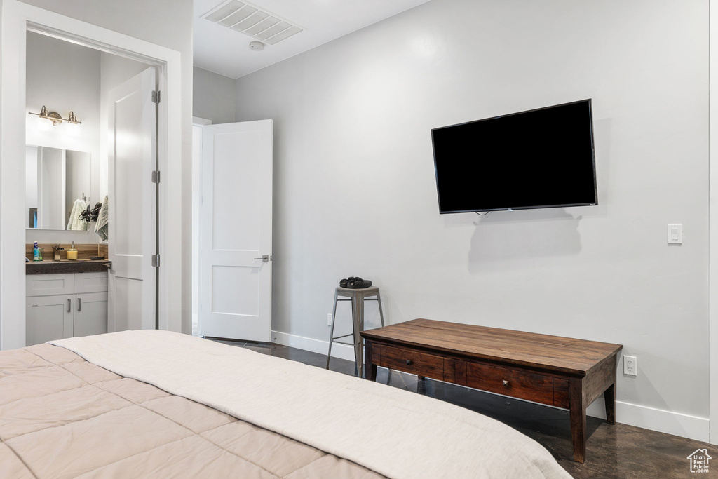 Bedroom featuring connected bathroom