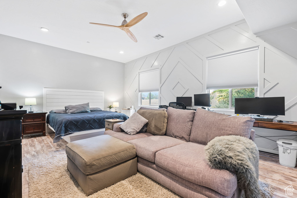 Bedroom featuring light wood-type flooring and ceiling fan