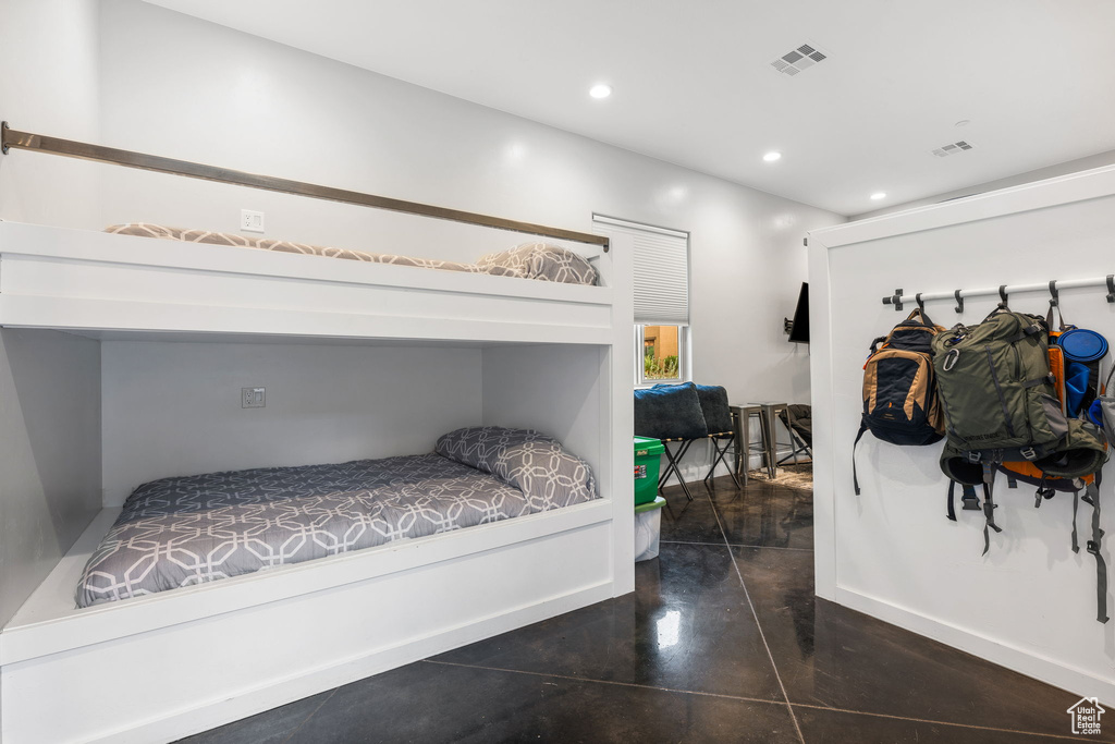 Bedroom featuring dark tile patterned flooring