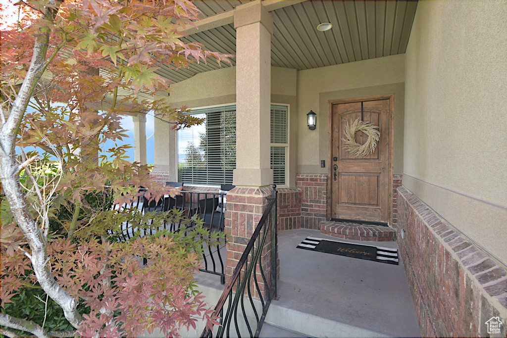 Entrance to property with a porch