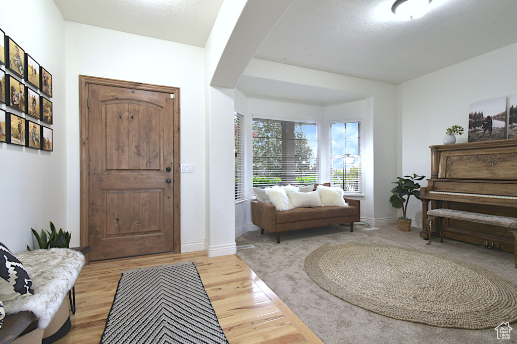 Foyer featuring light hardwood / wood-style floors