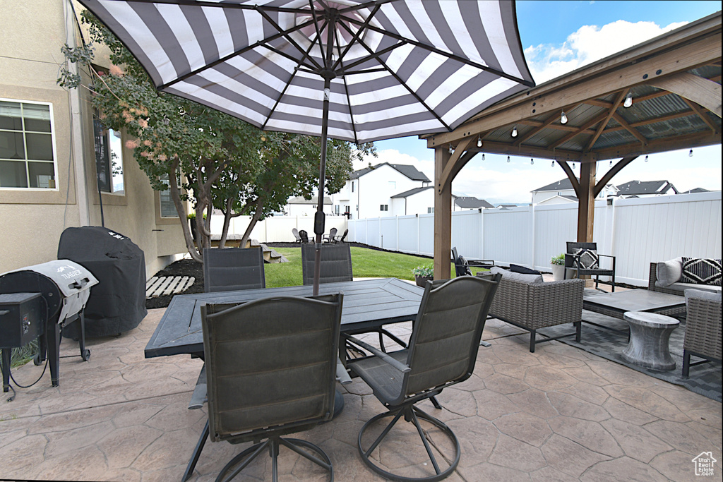 View of patio / terrace with an outdoor hangout area and a gazebo