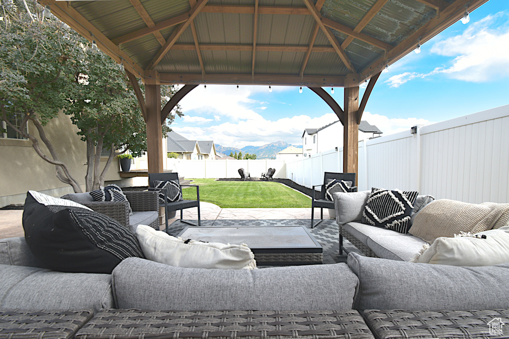 View of patio / terrace with outdoor lounge area and a gazebo