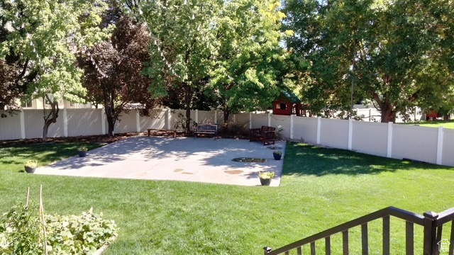 View of yard with a patio area