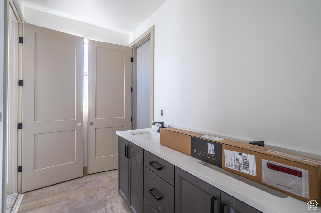 Bathroom featuring vanity and hardwood / wood-style flooring