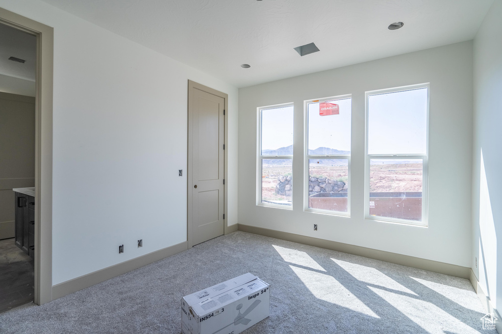 View of carpeted spare room