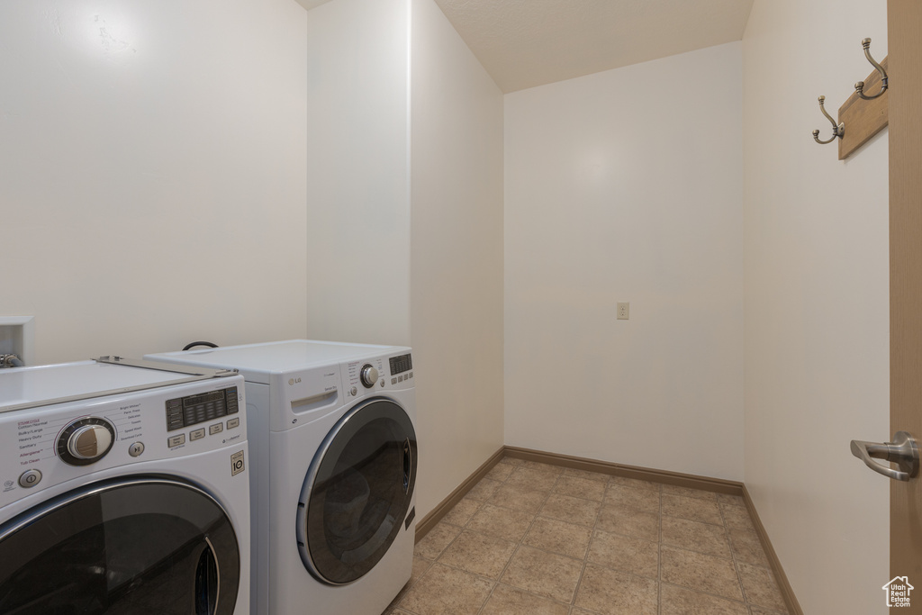 Laundry area featuring separate washer and dryer