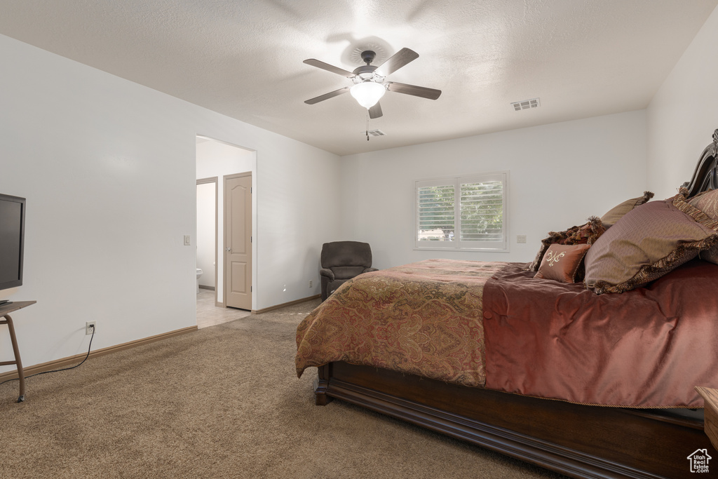 Bedroom featuring ceiling fan and light colored carpet