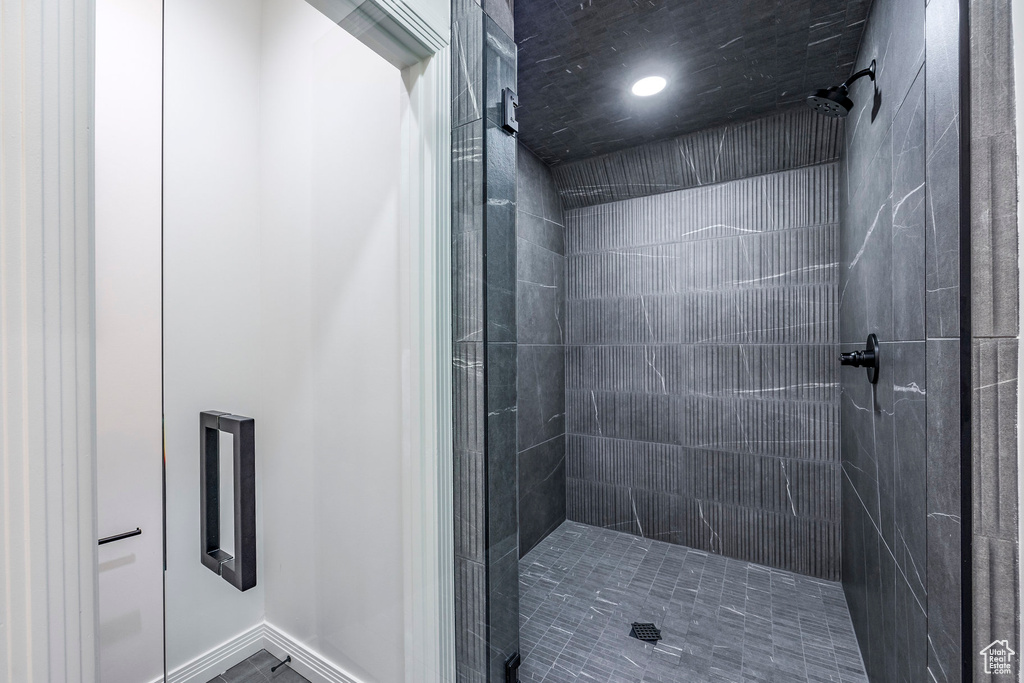 Bathroom with tiled shower