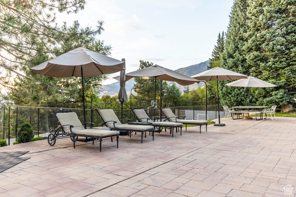 View of patio / terrace with a mountain view