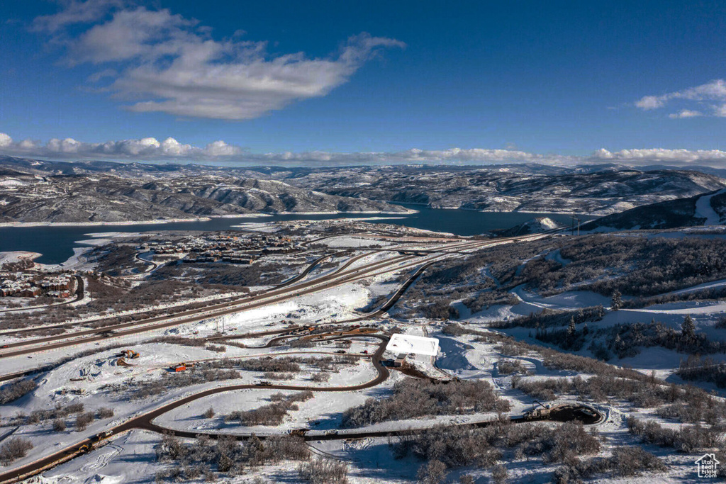 Snowy aerial view with a mountain view