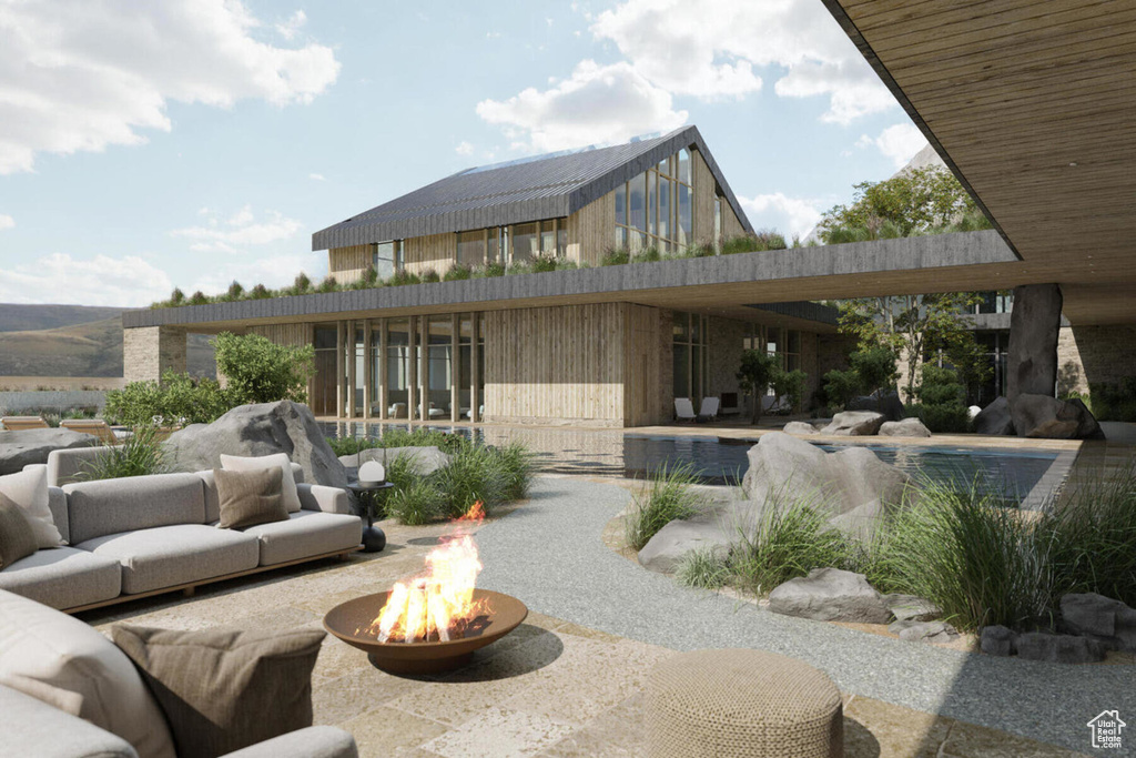 View of patio / terrace featuring a fire pit