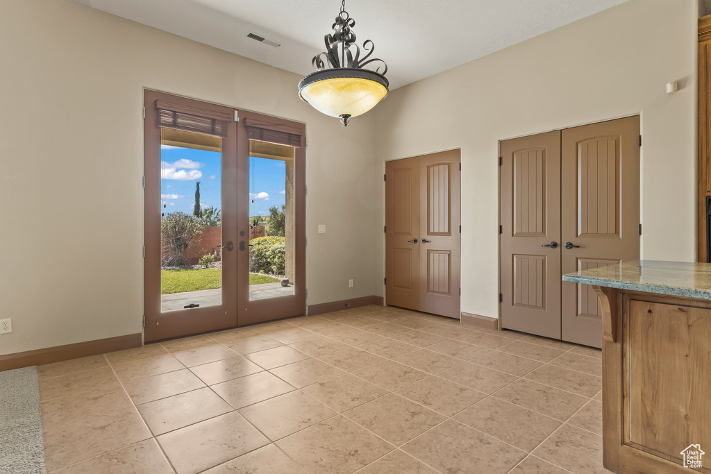 Interior space featuring light tile patterned flooring