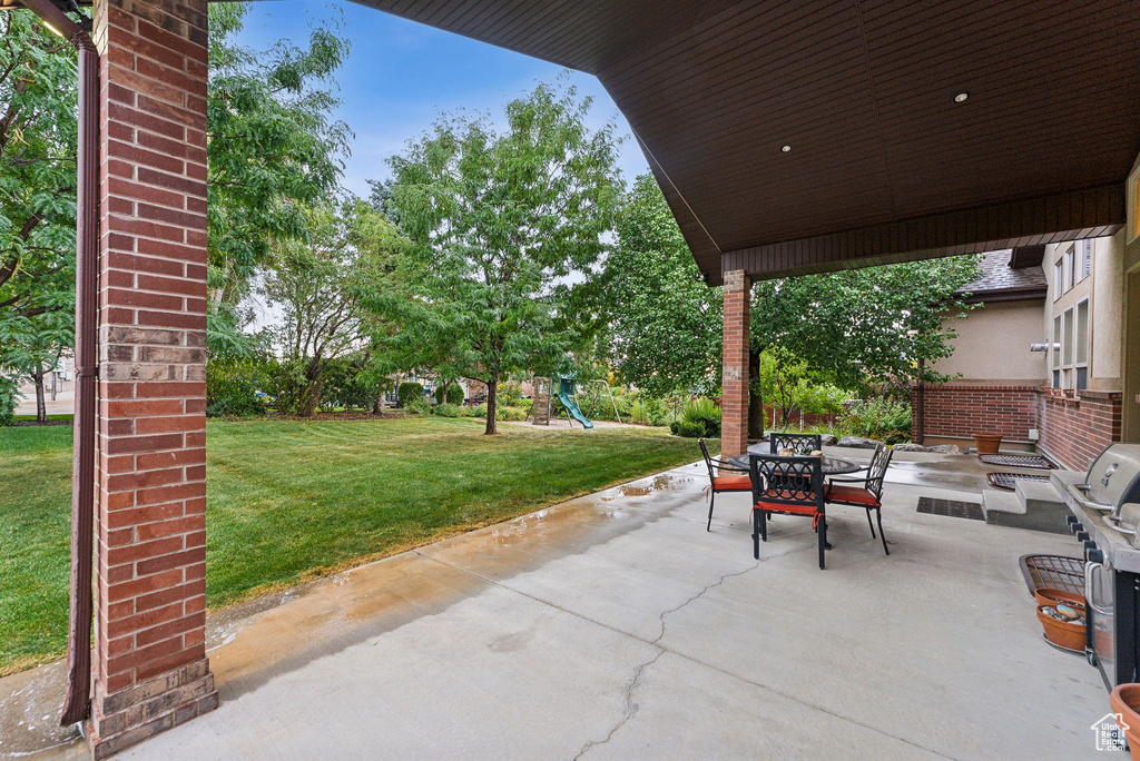 View of patio / terrace featuring a playground