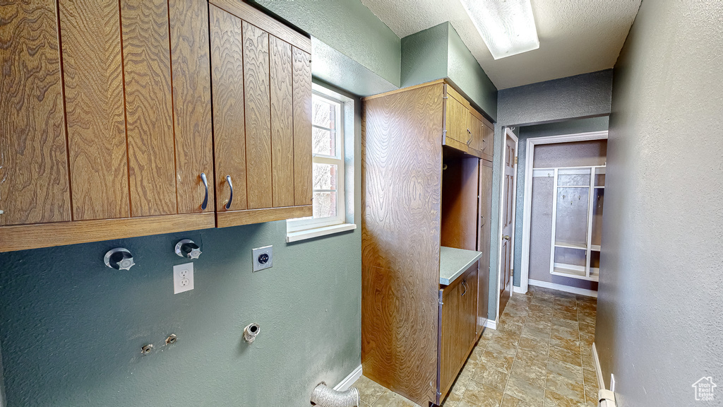 Kitchen featuring a textured ceiling