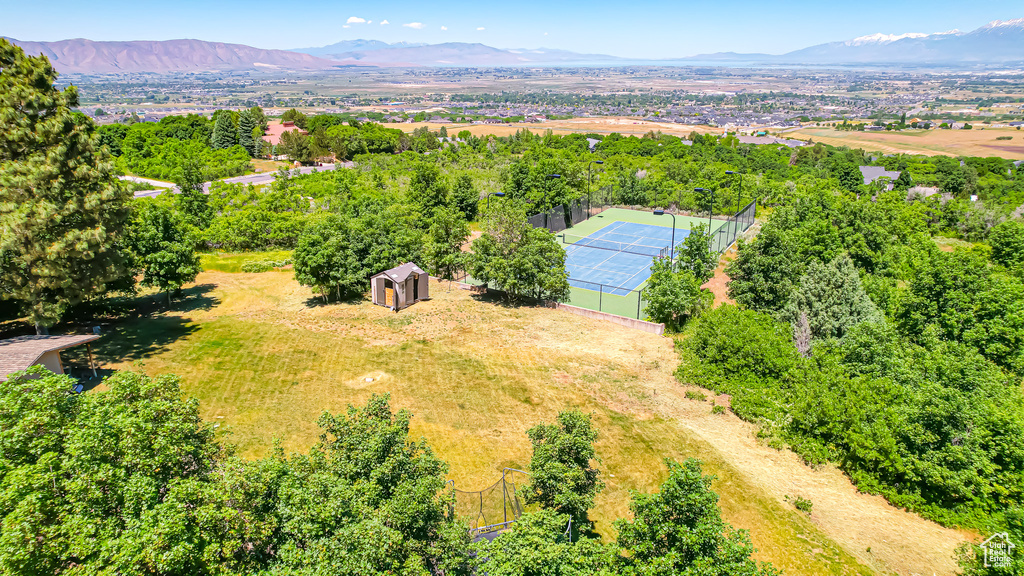 Birds eye view of property featuring a mountain view