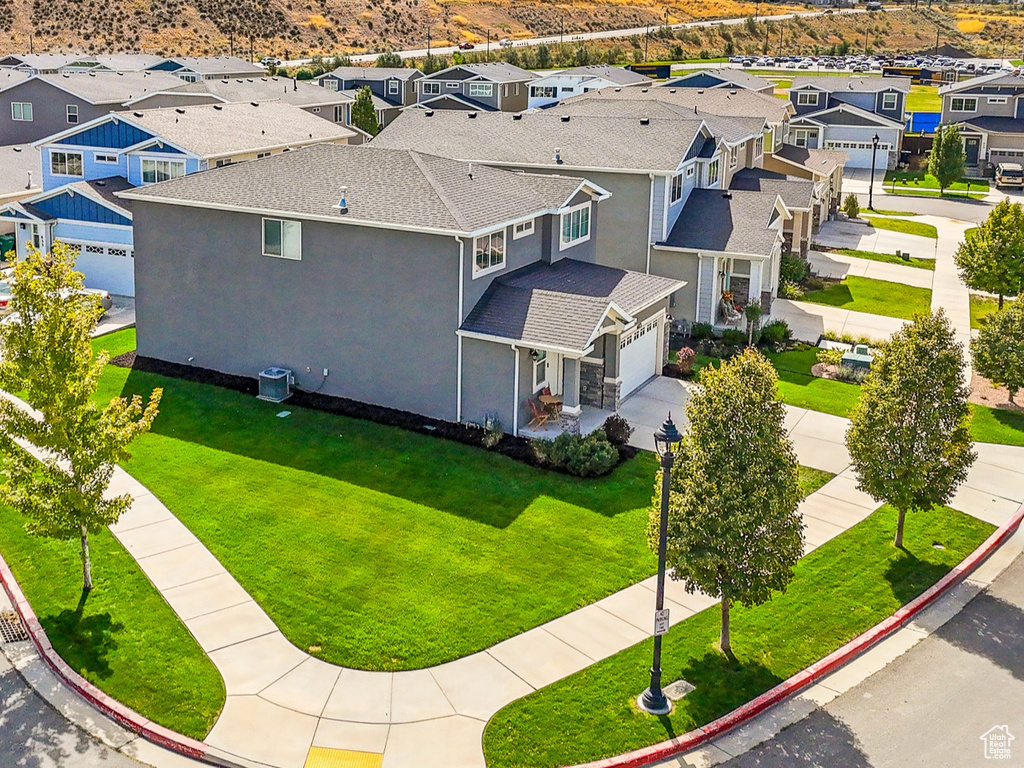 Birds eye view of property with a mountain view