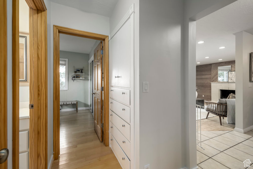 Hall featuring light hardwood / wood-style flooring