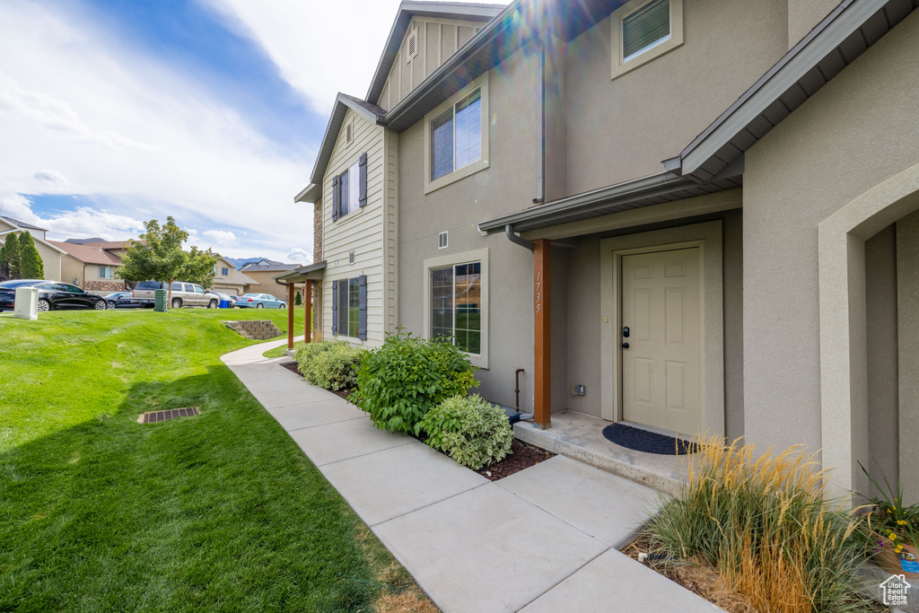 Exterior space with a lawn