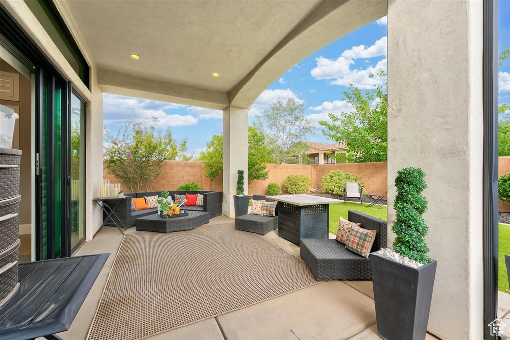 View of patio with outdoor lounge area