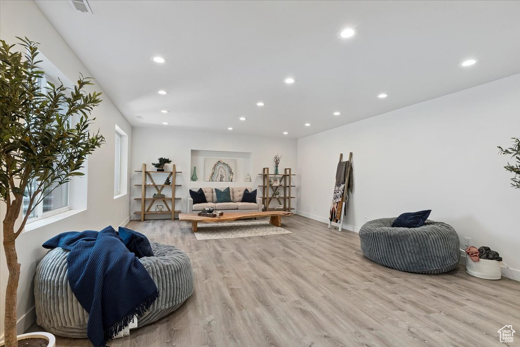 Living room with light wood-type flooring