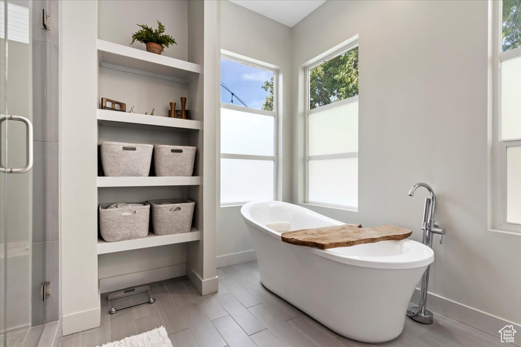 Bathroom with independent shower and bath