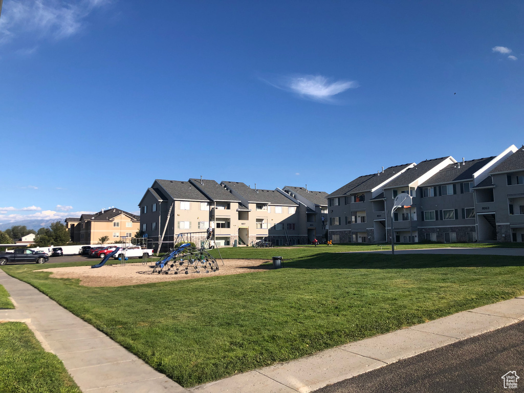 View of home's community featuring a lawn