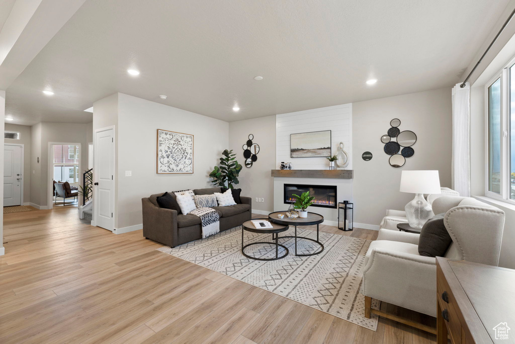 Living room with light wood-type flooring