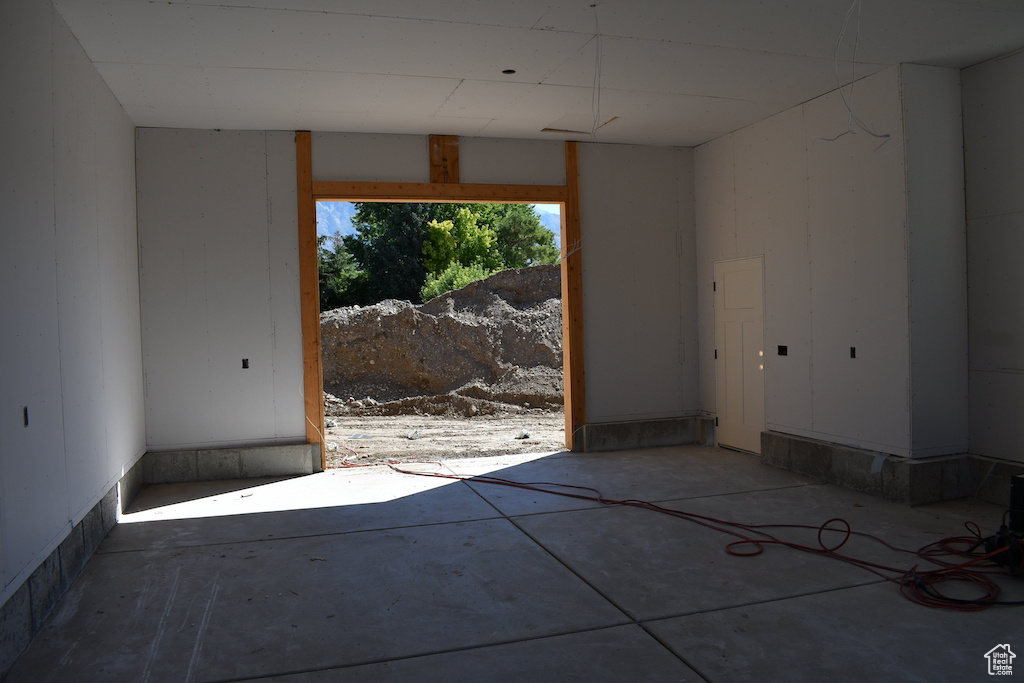 Spare room with concrete floors