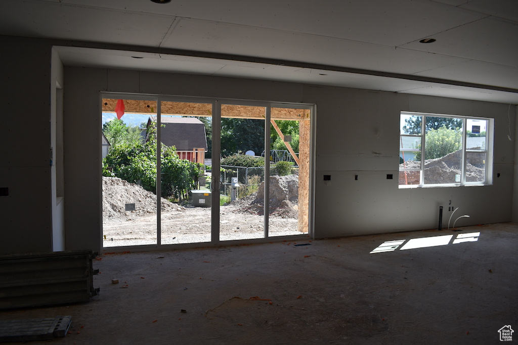 Spare room featuring plenty of natural light