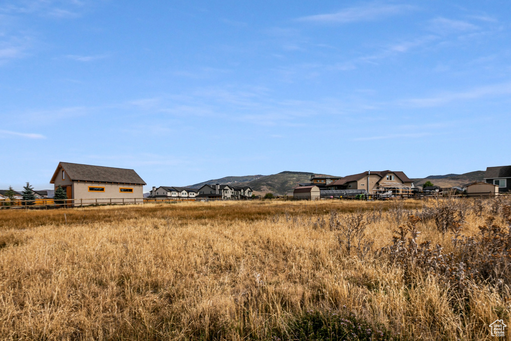 View of mountain feature with a rural view