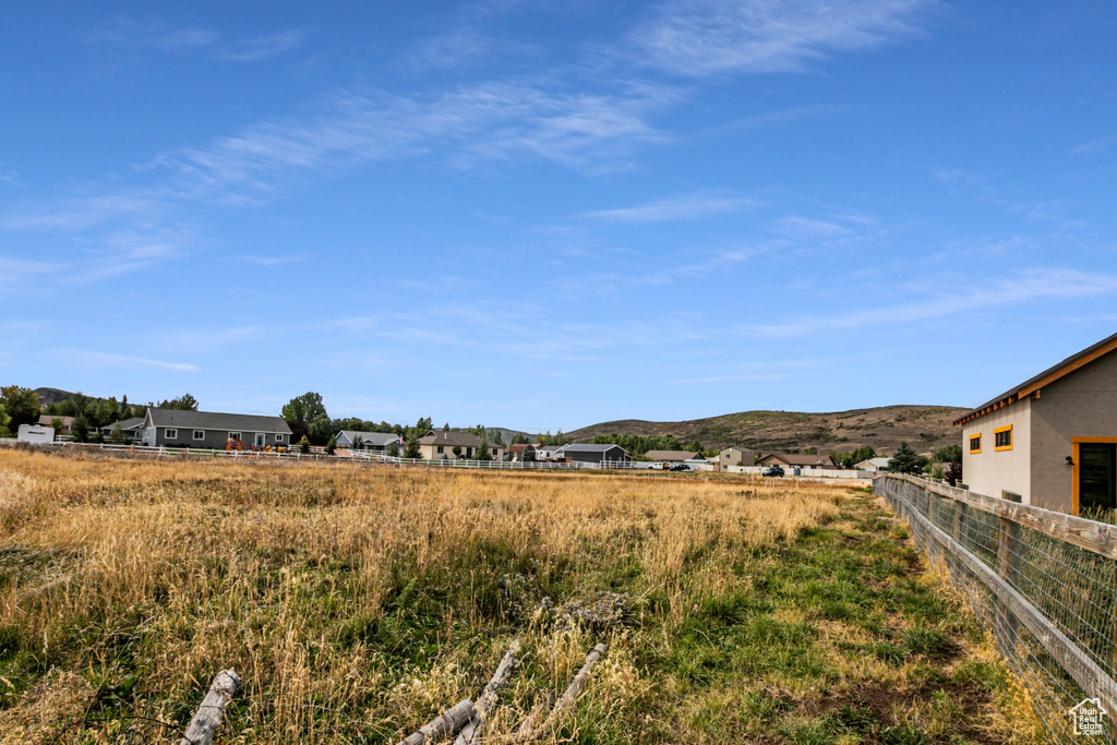 View of yard with a mountain view