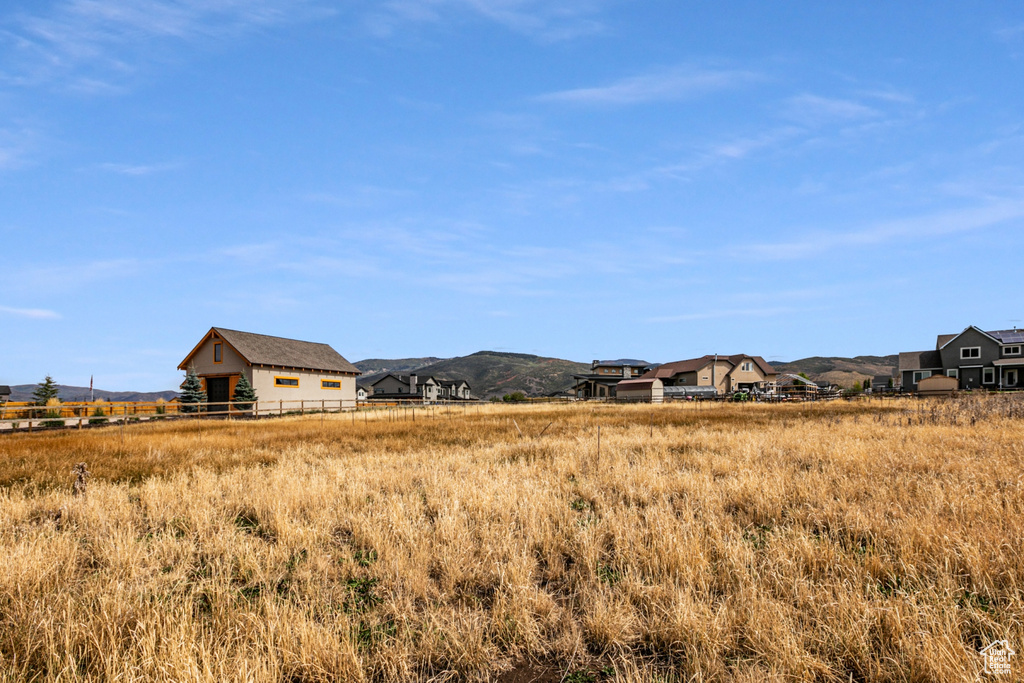 Property view of mountains featuring a rural view