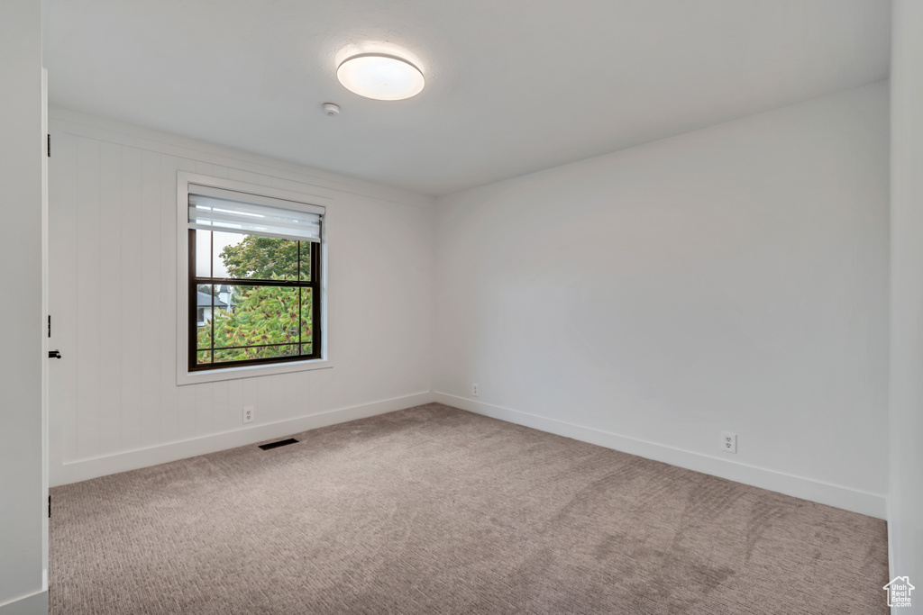 View of carpeted spare room