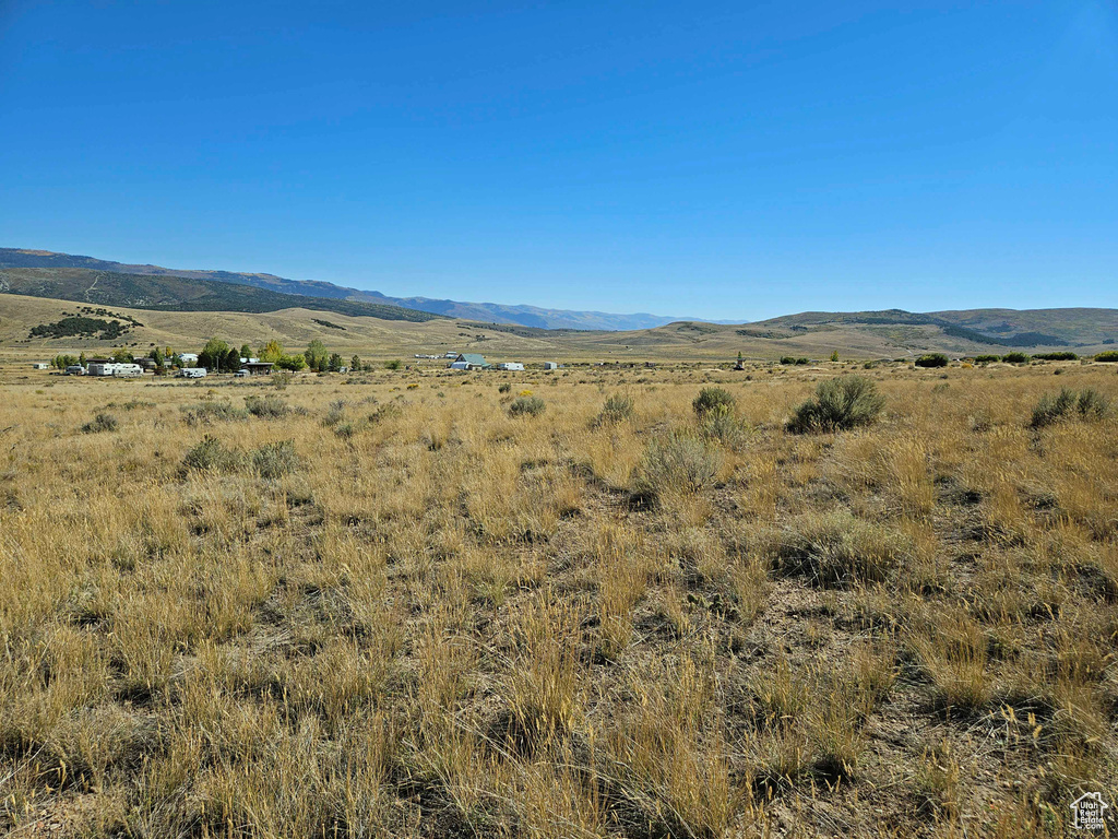 Property view of mountains featuring a rural view