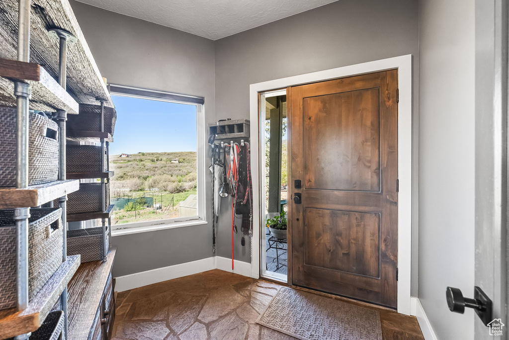 Entryway with a textured ceiling