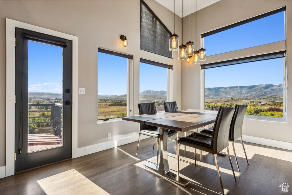 Dining room with a mountain view and a wealth of natural light