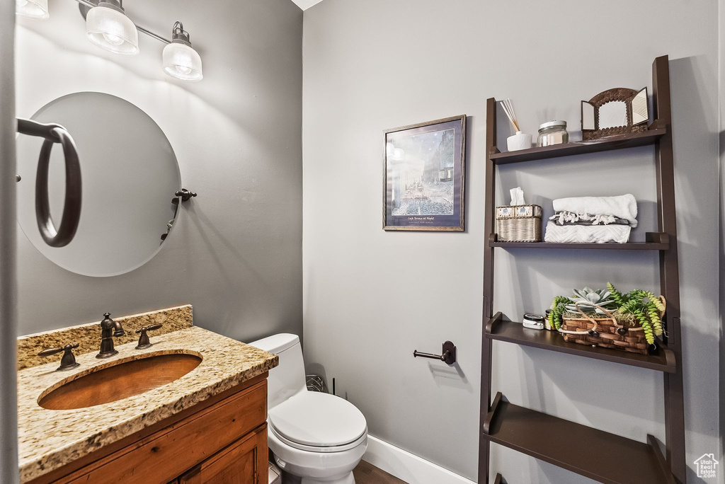 Bathroom with vanity and toilet