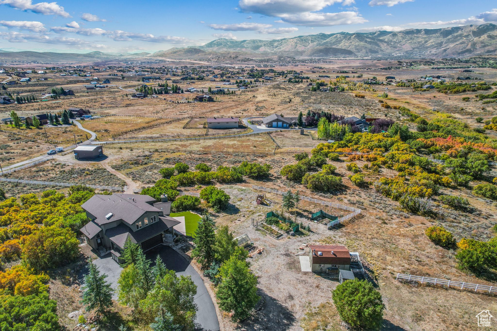 Birds eye view of property featuring a mountain view and a rural view