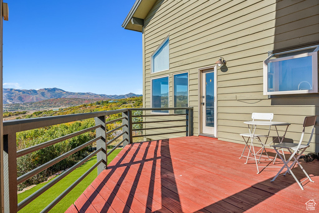 Wooden deck with a mountain view