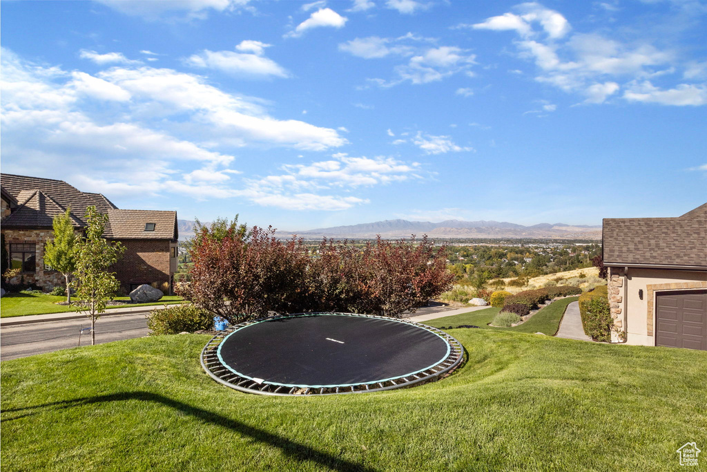 View of yard with a mountain view