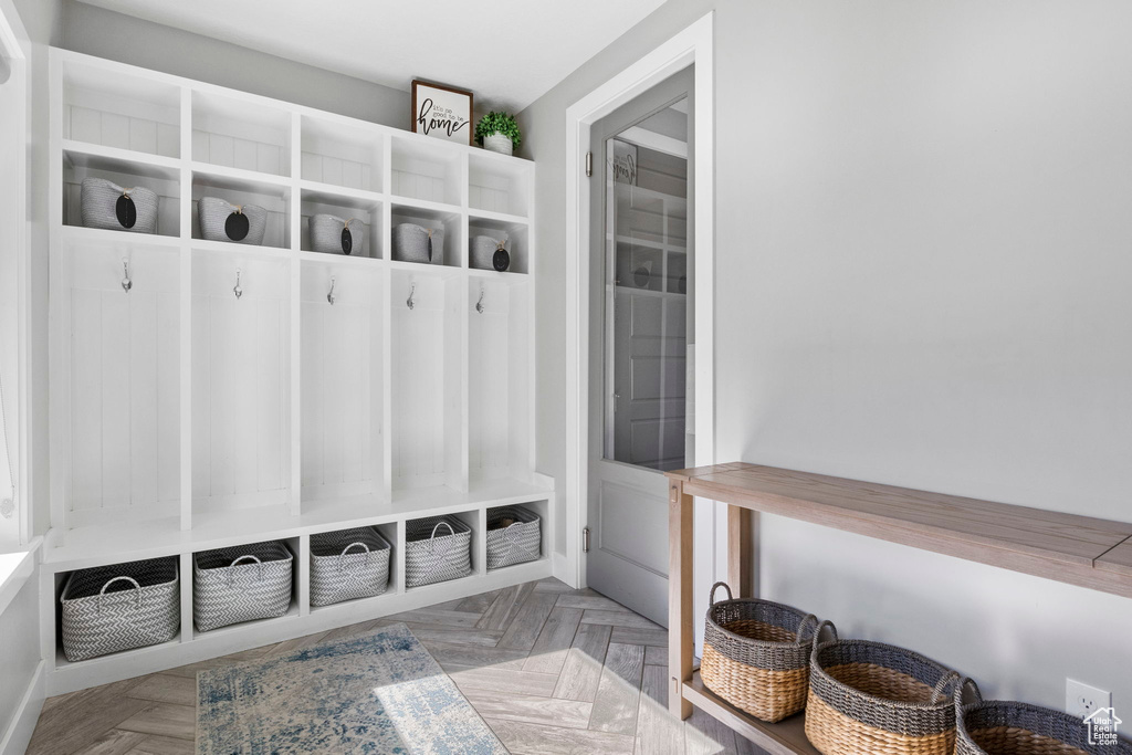 Mudroom featuring light parquet floors