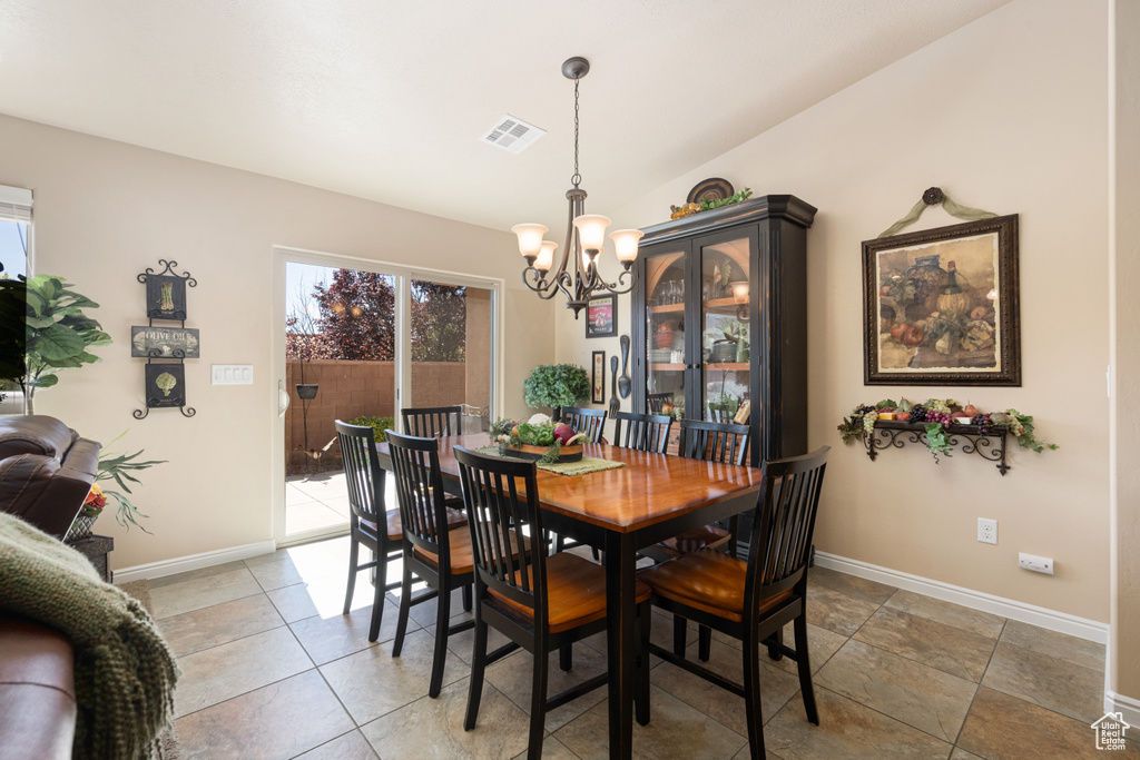 Dining space with a chandelier